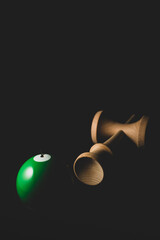 Kendama is a traditional Japanese skill toy. It consists of a handle (ken), a pair of cups (sarado), and a ball (tama) that are all connected together by a string