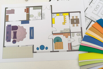  paint color samples with drawing instruments on house plan project