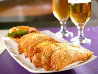 Pastries with pepper sauce