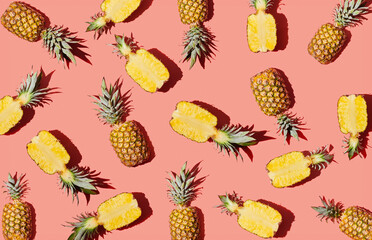 Pattern of pineapple on coral background