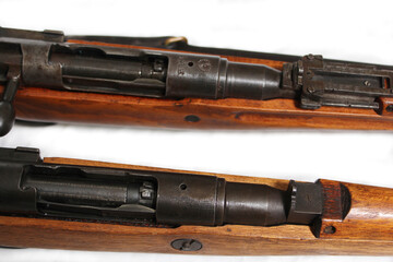 Two Versions of Japanese Arisaka Rifles from WW2. One with Imperial Mum removed and one with intact mum.