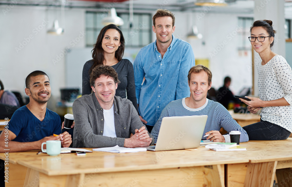 Poster Theyre a team that gets it right the first time. Portrait of a group of colleagues working together in a casual work environment.