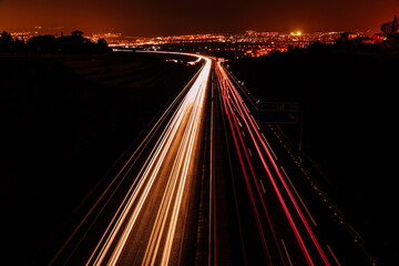 Fototapeta na wymiar car trails on a road at dusk. night photograph of a road in spain.