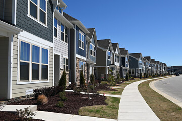 Fototapeta na wymiar New tract homes stretch off into the distance in a planned community outside of Raleigh, North Carolina