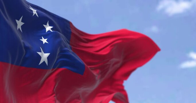 Detail of the national flag of Samoa waving in the wind on a clear day