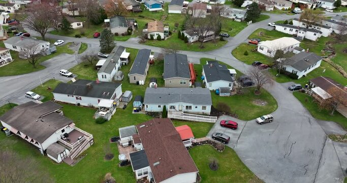 Mobile home park in USA. Aerial descending establishing shot.