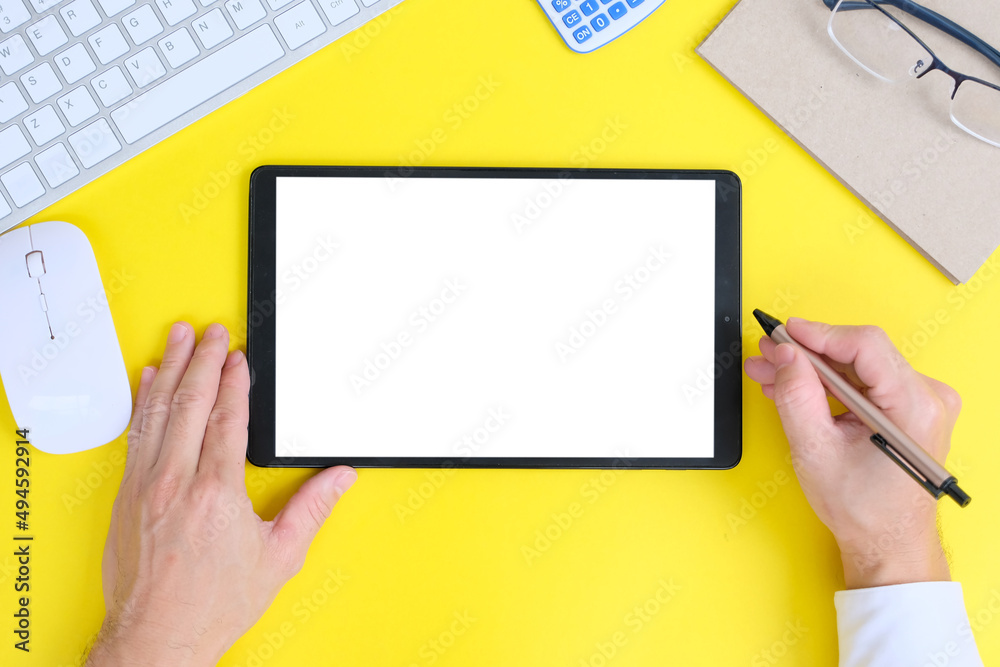 Poster tablet computer with isolated screen. business workplace with computer and wireless mouse and keyboa
