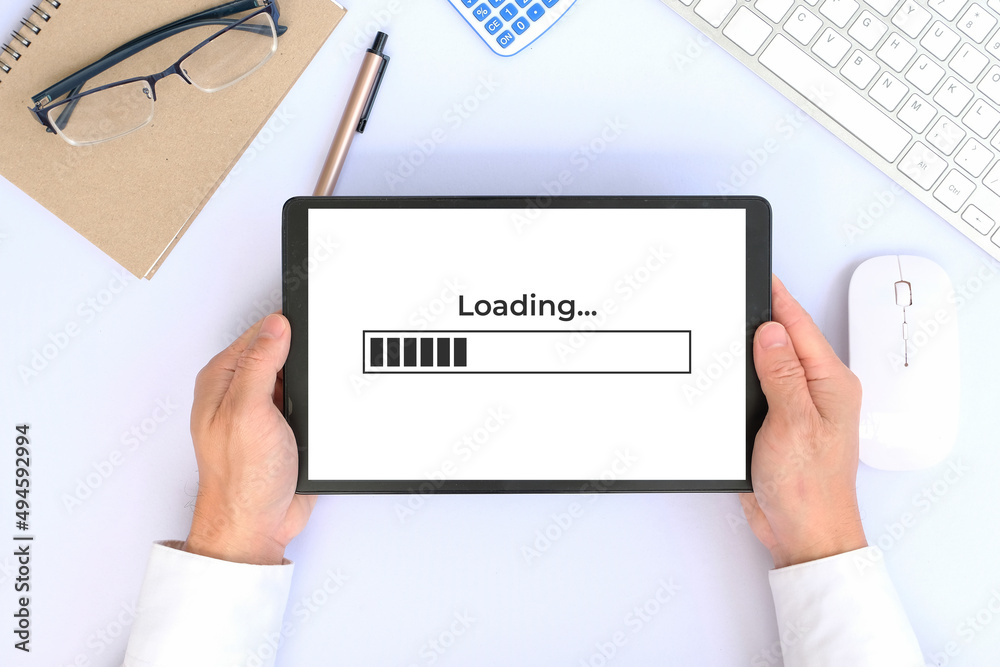 Poster hand used tablet with concept of improving website loading speed