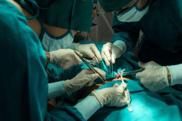 professional surgeon doctor teamwork person working in hospital operation room with surgery medical...