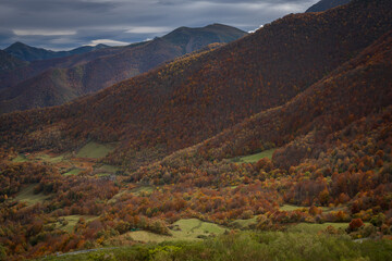 Fototapeta na wymiar Mountain range landscape during Autumn in Corzo viewpoint in Picos de Europa national park, Spain