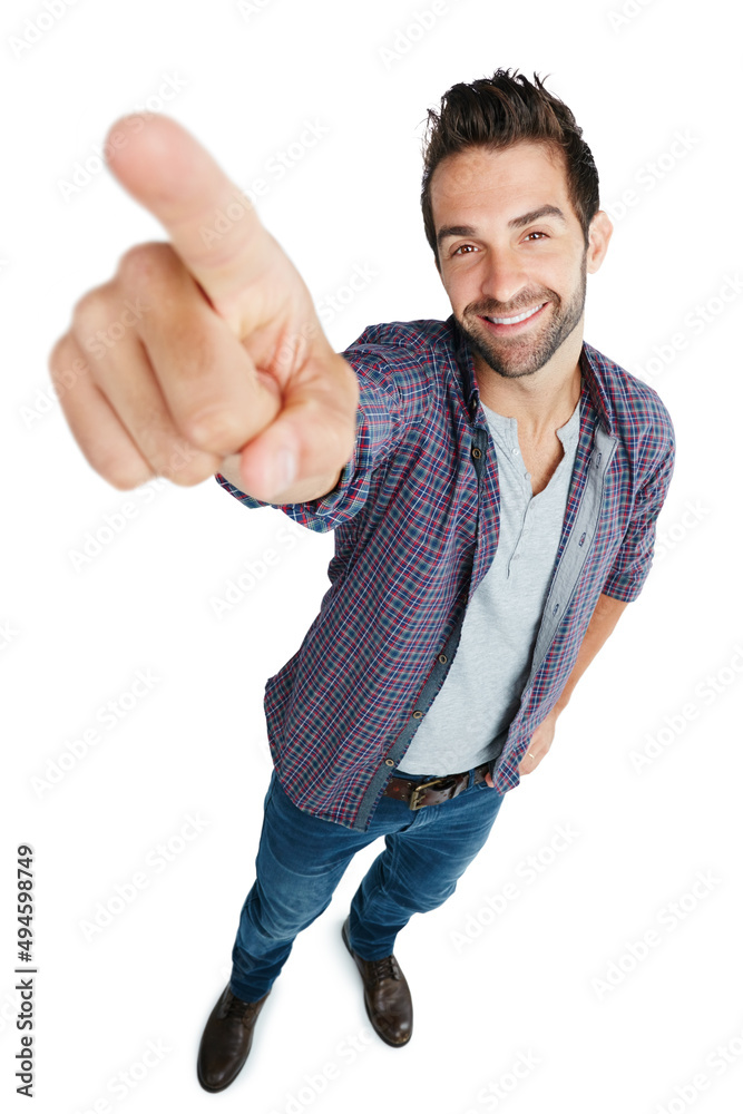 Poster it doesnt get any bigger than this. studio shot of a young man pointing against a white background.