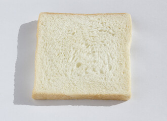 
A slice of bread on a white background