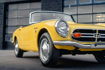 Fototapeta na wymiar Yellow Japanese Classic Convertible Sports Car
