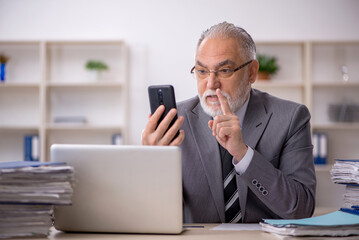 Old male employee and too much work in the office