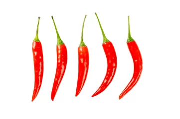 Fotobehang Red hot chili peppers on white background. © Suraphol