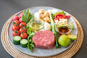 Spicy Thai Beef Salad will be cooked by ingredient such as red beef, onion, green vegetables, Red Radish, pepper, lemon ,and garlic.