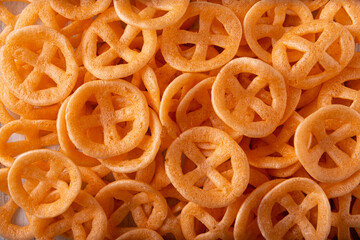 Chicharrones de Harina. Also known as duros, duritos, Mexican wagon wheels or pinwheels, they are a very popular snack made from flour, commonly accompanied with hot sauce and lemon juice.