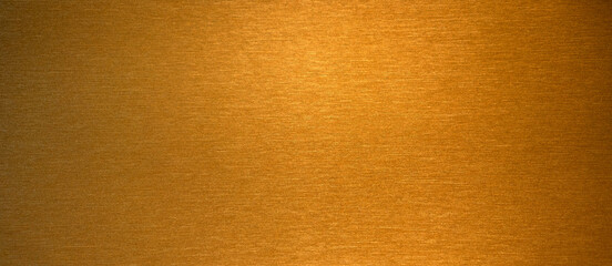 Rectangular texture of golden color. Golden background for text. The photo is golden in color.