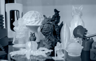 Objects printed on 3D printer from plastic close-up. New 3D printing technology. Concept modern new...