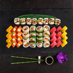 tasty sushi on the black stone