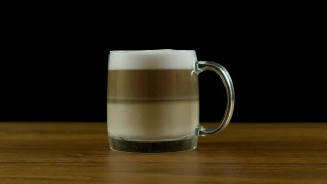 Cinematic coffee.  Slow zoom on a fresh coffee.  Fresh latte.  Delicious coffee.  Unusual coffee.  Original coffee
