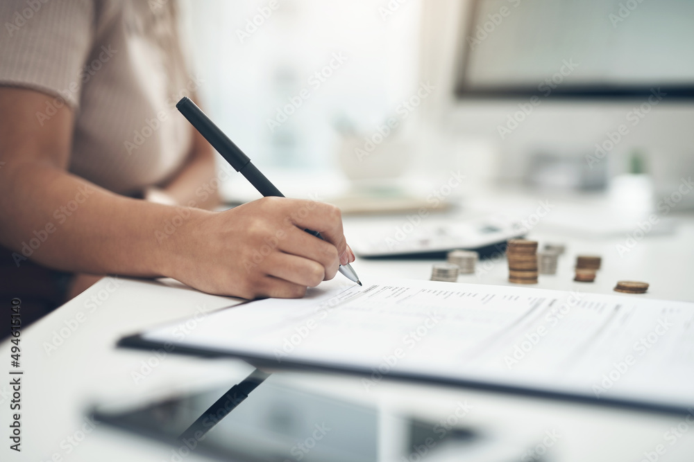 Poster Budgeting is an integral part of running a business efficiently. Closeup shot of an unrecognisable businesswoman calculating finances in an office.
