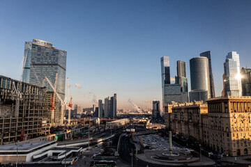 Obraz premium urban industrial landscape in the morning at sunrise shot from a drone 