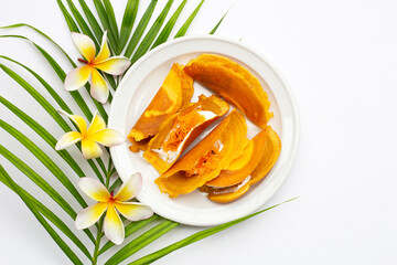 Thai crispy pancakes on white background.