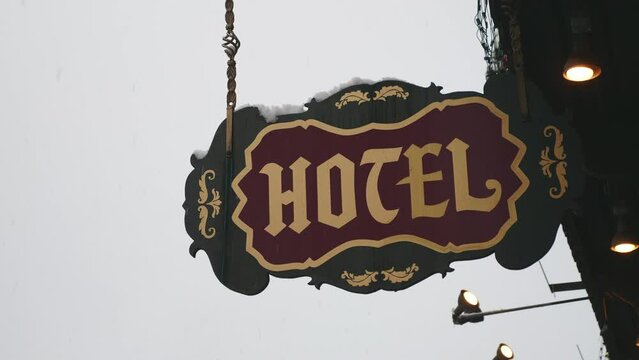 Leavenworth, Washington - Generic sign for a hotel hanging from an awning of a building.  Exterior sign for the Bavarian Hotel Ritz in the German Bavarian themed town