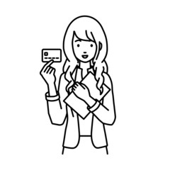 立って書類とカードを手に持つジャケットの女性