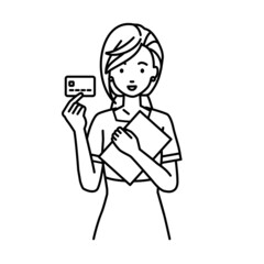 立って書類とカードを手に持つエステ店員・接客・受付の女性