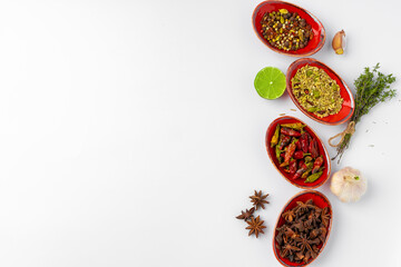 Obraz na płótnie Canvas Bowls with various spices on white background