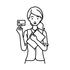 立って書類とカードを手に持つ事務員制服の女性