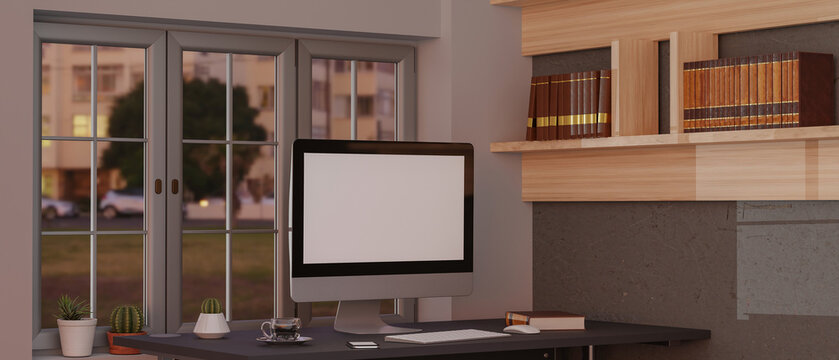 Blank screen desktop computer on desk with books and cup. 3d rendering