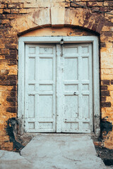 old wooden door in wall