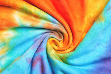 Abstract tie dye multicolor twisted fabric cloth Boho pattern texture for background or groovy wedding card, sale flyer, 60s, 70s poster, tie-dye diy backdrop. Modern Watercolor Wet Brush Fabrics Art