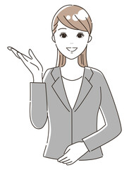 案内するスーツを着た女性（上半身）