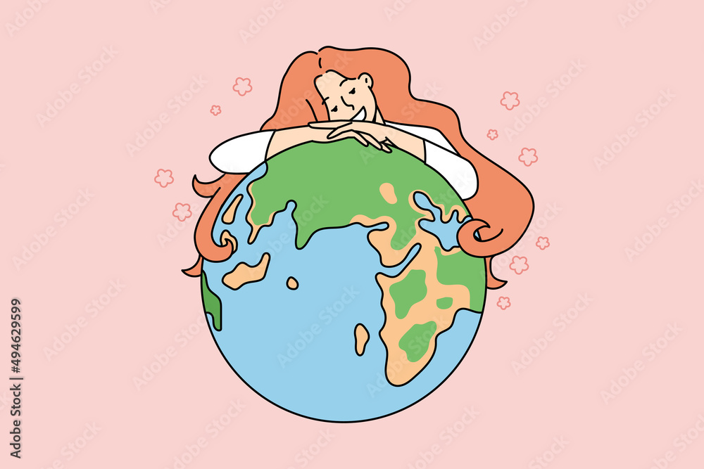 Wall mural smiling young woman hug planet earth show love and care to nature. happy girl embrace globe demonstr