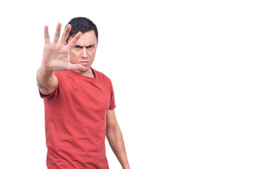 Male model demonstrating stop gesture on white background