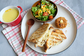 Delicious homemade meal. Cheese Toast with Salad Bowl and Potato Korokke.  Great for breakfast and tea break