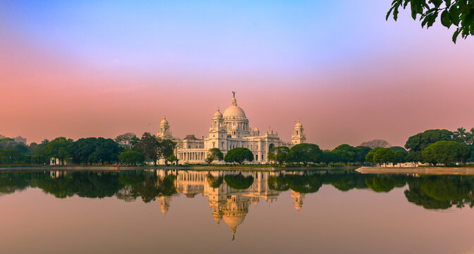 View of a large marble building in Central Kolkata, Named as The Victoria Memorial ,a which was built between 1906 and 1921. Foreground is Blurred and Selective Focus is used.