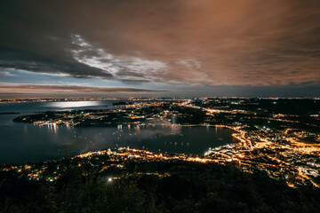 night landscape over the city by the lake