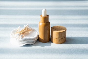 Blank bamboo essential oil bottles with pipette, bamboo jar and reusable face sponges. Organic spa...
