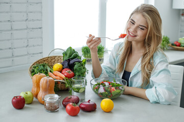 Healthy food woman. Beautiful woman eats a salad. High quality photo