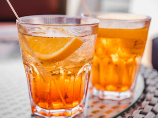 Beautiful glass with a refresh cocktail, standing on the bar. Top view, close-up. Vacation and travel concept. Moments of celebration