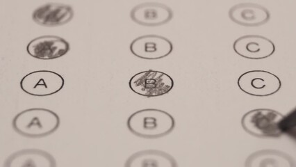 Filling Bubble Test With A Pencil. Education And Exams Concept. Close Up