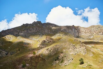 Fototapeta premium Autumn mountain landscape. Yellow trees on a clear day.