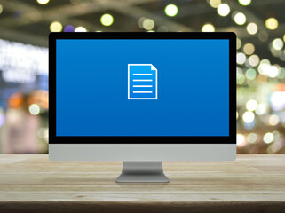 Document flat icon on desktop modern computer monitor screen on wooden table over blur light and shadow of shopping mall, Technology internet online concept