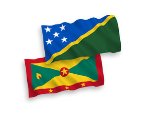 Flags of Solomon Islands and Grenada on a white background