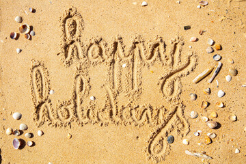 happy summer holidays-  text on the beach